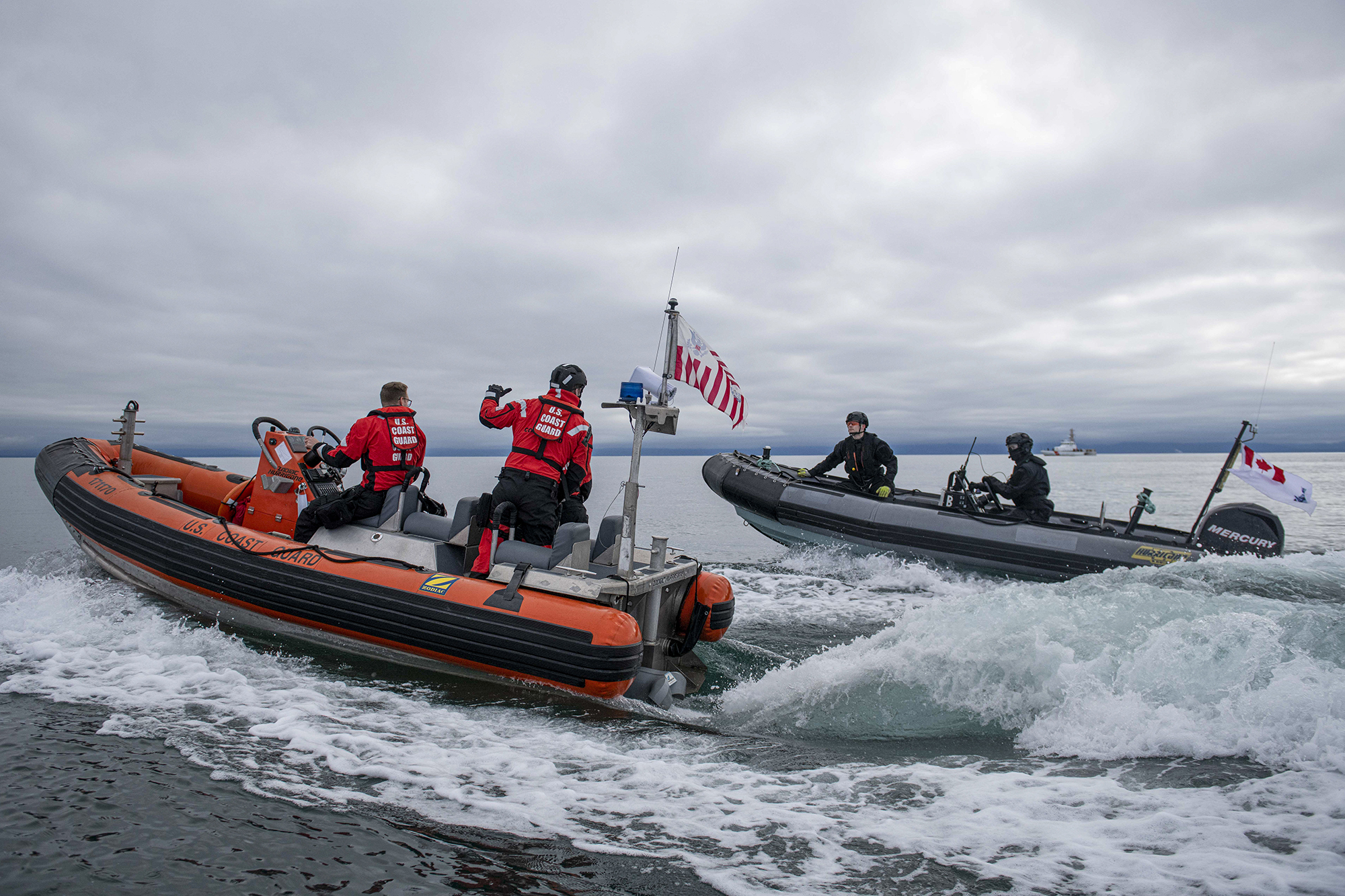 Royal Canadian Navy members from HMCS Yellowknife conduct Rigid Hull Inflatable Boat (RHIB) training with U.S. Coast Guard members in the waters off Victoria, British Columbia, Canada, on Feb. 18, 2022. The exercise was conducted to prepare Royal Canadian Navy members for upcoming deployments to support United States counter-narcotics operations. Photo: Royal Canadian Navy