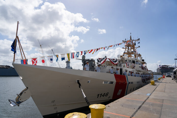 The Coast Guard Cutter John Scheuerman's crew stand at attention during the vessel's commissioning ceremony in Tampa, Florida, Feb. 23, 2022. The John Scheuerman is the 46th Sentinel-class fast response cutter and the fifth of six FRC's to be homeported in Manama, Bahrain, which will replace the aging 110’ Island Class Patrol Boats. Photo: U.S. Coast Guard