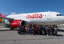 Air Malta hosts an educational flight for children from Church homes