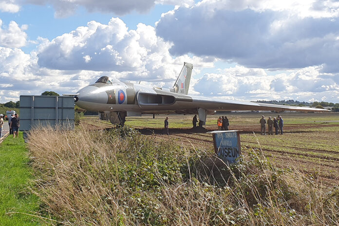 Vulcan bomber at Wellesbourne airfield has just overshot the runway during a hot taxi run. Almost made it to the road. Photo: Lloydyy22 (Twitter)