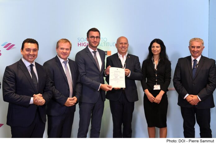 Eurowings Europe Ltd. Managing Director, Stefan Beveridge receiving the AOC Certificate from CAD Director General Capt. Charles Pace. Photo: DOI