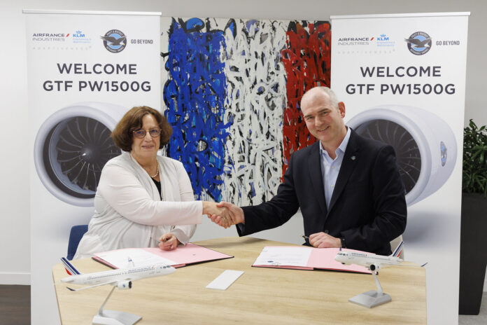 Marc Meredith, executive director of GTF Engine Aftermarket at Pratt & Whitney (right) shakes hands with Anne Brachet, executive vice president of Air France-KLM Engineering and Maintenance (left), welcoming Air France Industries KLM Engineering & Maintenance to the GTF MRO network. Photo: Pratt & Whitney