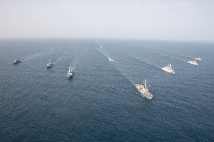 Ships and submarines sail in formation during NATO exercise, Dynamic Manta 23-1. Nine Allied nations converged for the anti-submarine warfare event in the Central Mediterranean. Photo: U.S. Navy Mass Communication 2nd Class Ezekiel Duran