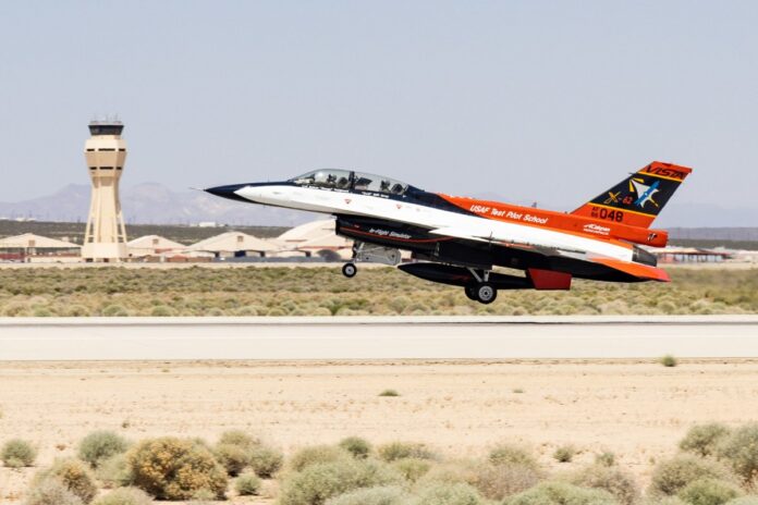 U.S. Air Force Secretary Kendall Flies In AI-Piloted X-62A VISTA