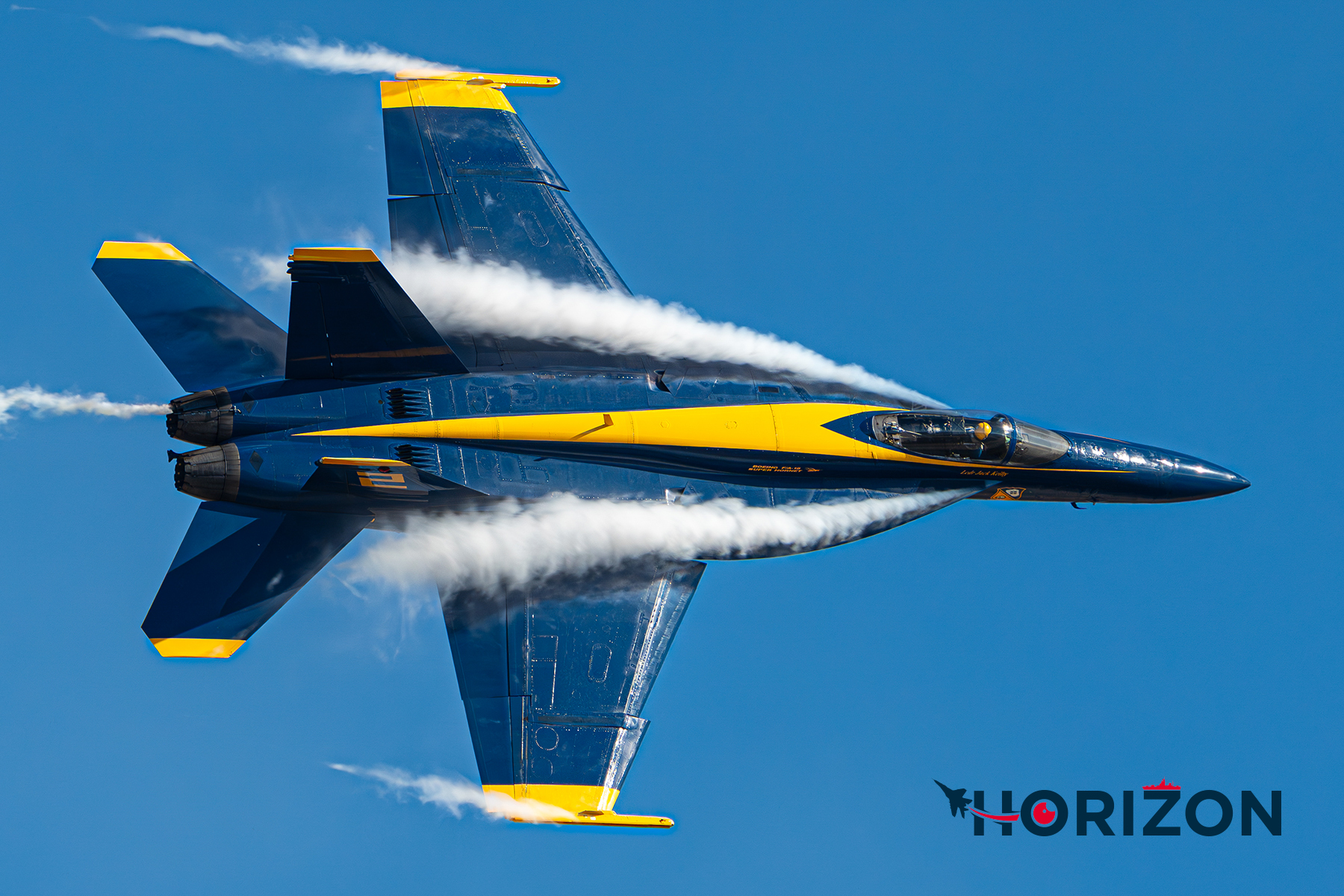 The Right Wing LCDR Jack Keitly exiting behind the crowd