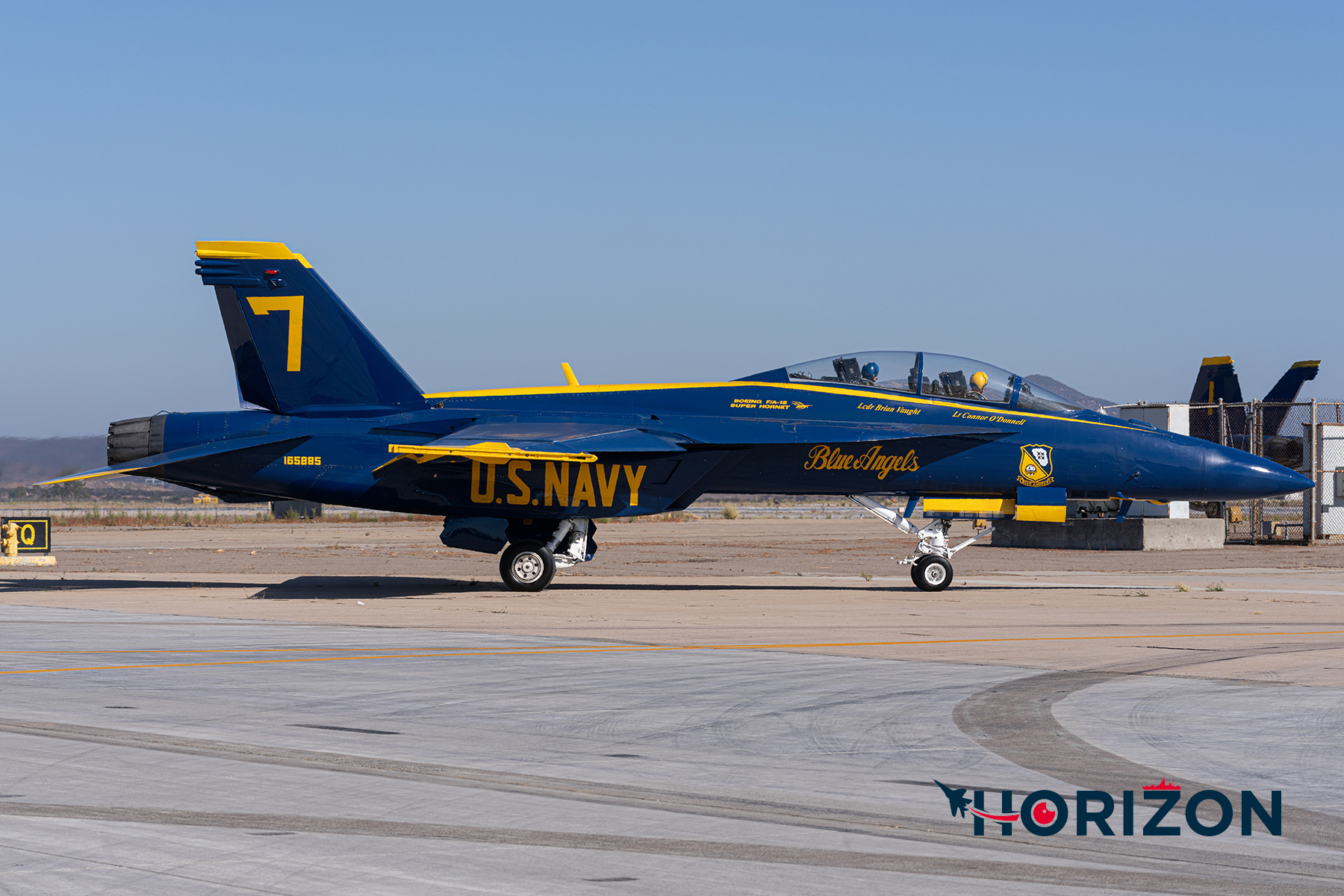 US Navy Blue Angel #7 is the two seat variant of the Super Hornet and on the first day of the show it is flown by Blue Angel #5 Pilot in order to provide a backseat flight to either a selected key influencer (KI) or credentialed media representative.