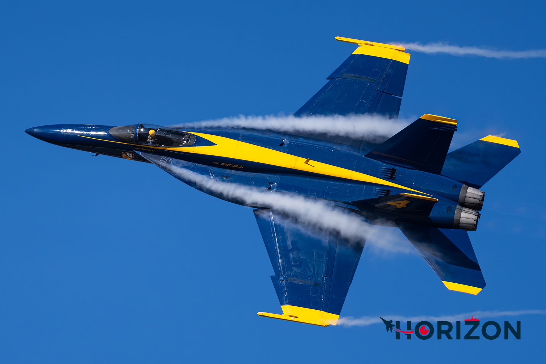 The Slot Pilot LCDR Amanda Lee exiting behind the crowd line