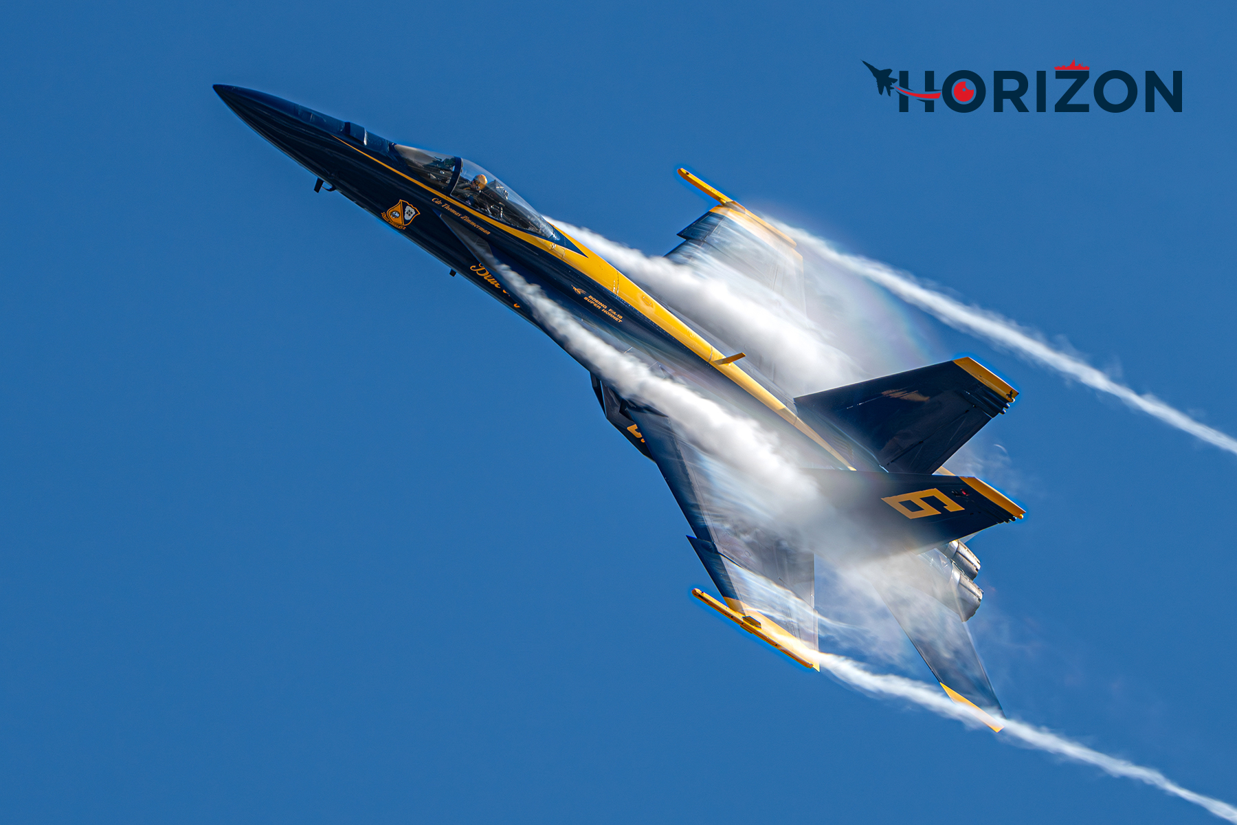 The Opposing Solo CDR Thomas Zimmerman as Blue Angel #6 egress to the left behind the crowd line to join the rest of the