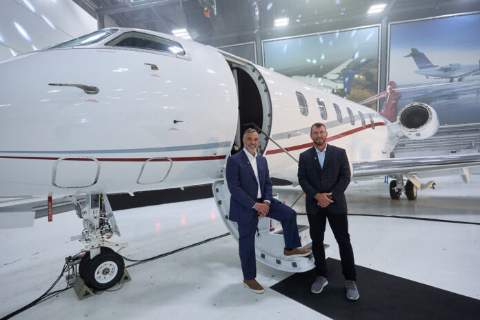 AB Jets co-owners Andrew Bettis (left) and David Turner (right), celebrate the delivery of the company’s first Challenger 3500 business jet. Photo: Bombardier Inc.